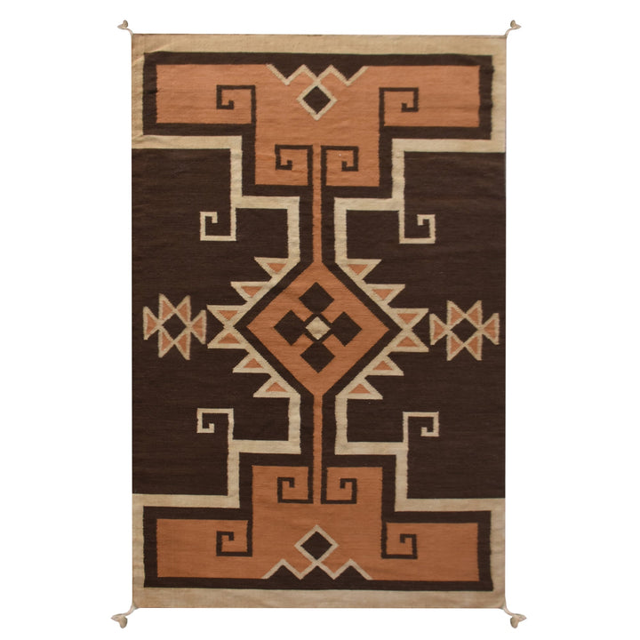 Ember flatweave New Zealand wool rug with rust and cream Southwestern diamonds, in an entryway