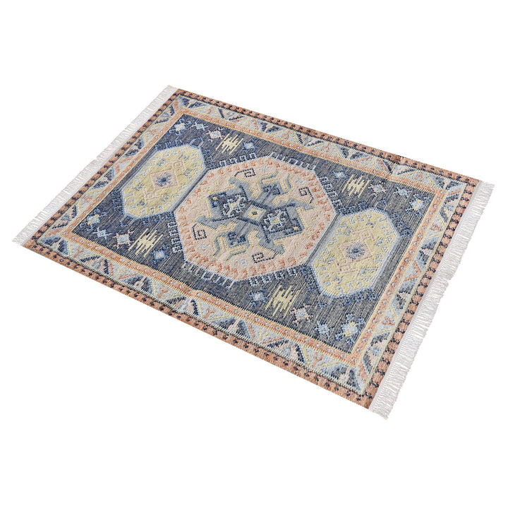 Harbour flatweave navy wool and hemp kilim rug with gold and rust medallions, in an entryway