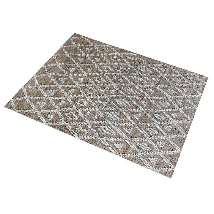 Thistle flatweave jute and wool rug with ivory tufted diamonds on taupe, in a living room