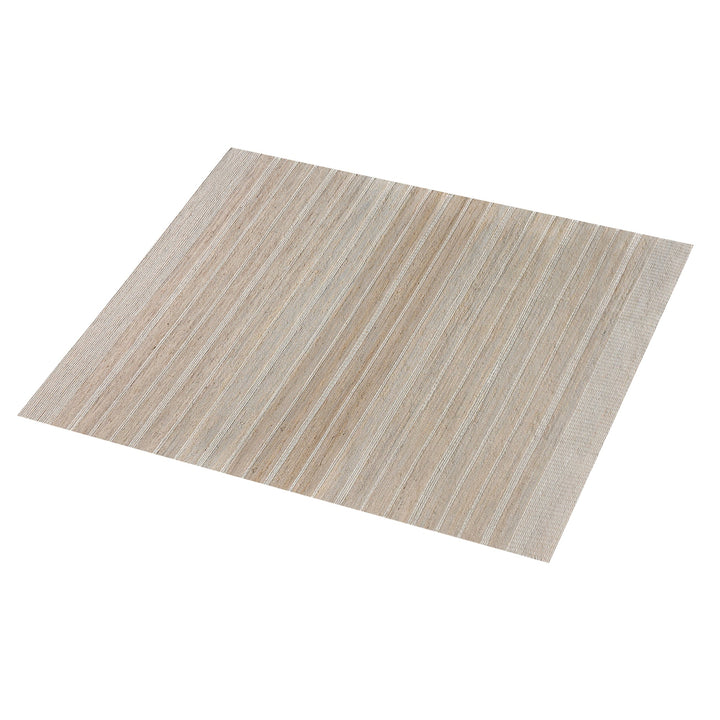 Taar handwoven wool and jute rug with fine vertical ribs in bleached natural and ivory, in a bedroom