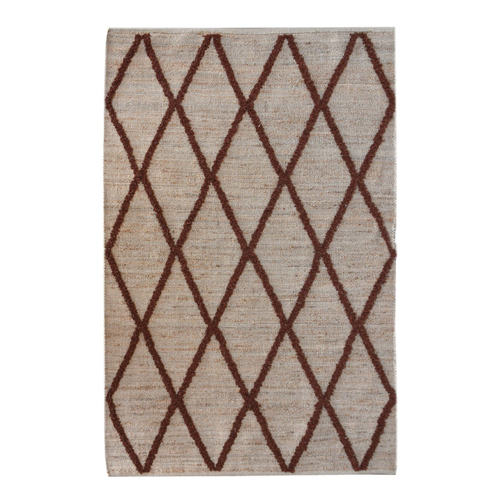 Lantern handwoven ivory hemp and PET rug with a rust diamond lattice, in a living room