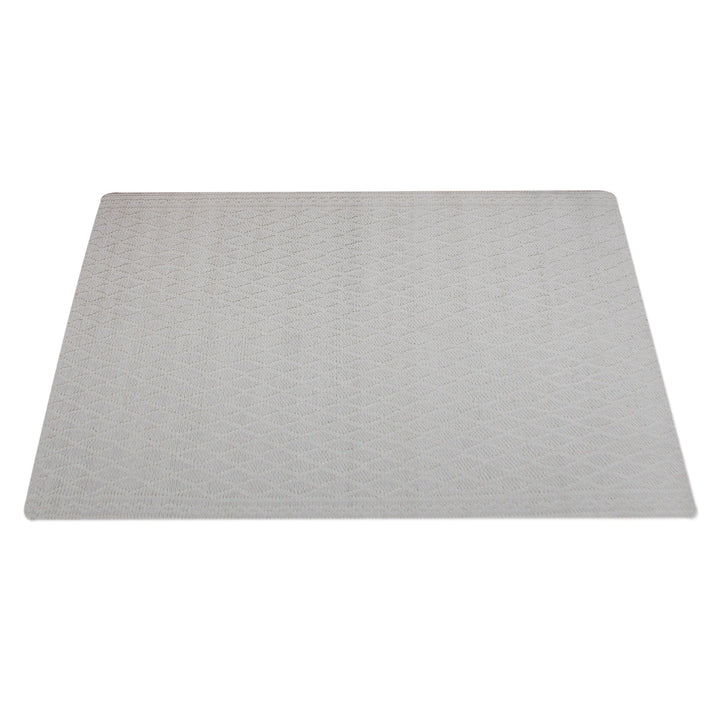 Jaal handwoven ivory wool rug with a raised cabled diamond lattice, in a living room