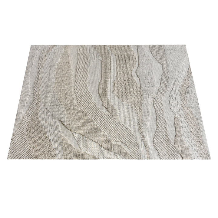 Pahad handwoven greige wool rug with carved contour waves, in a living room
