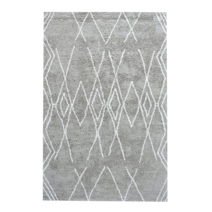 Jugnu tufted cotton and viscose rug with ivory diamond lines on silver grey, in a bedroom