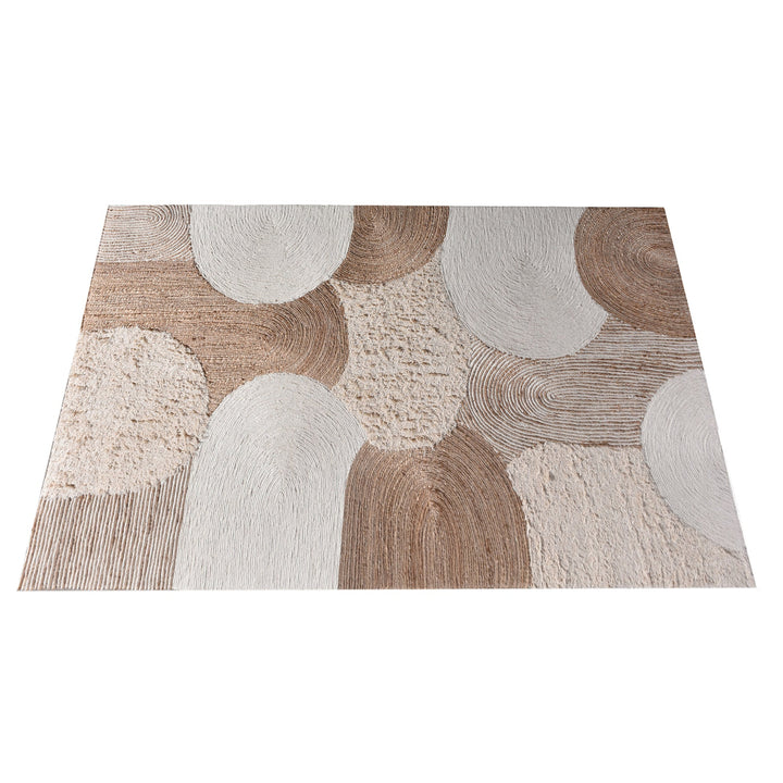 Boond handwoven wool, hemp and cotton rug with overlapping ivory and tan circles, in a bedroom