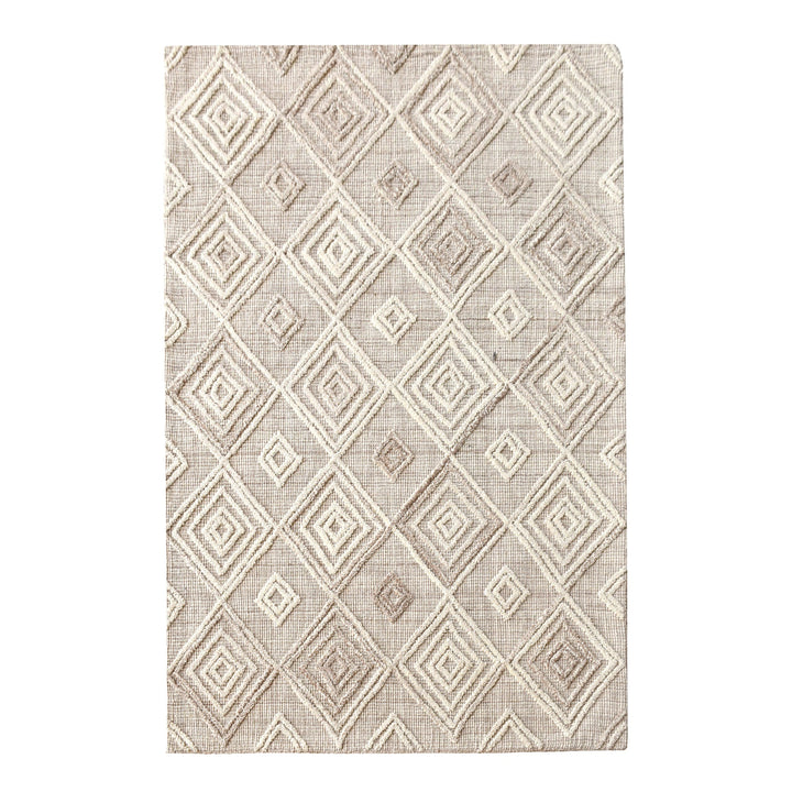 Jaali handwoven oatmeal wool rug with raised ivory diamond lattice, in a living room