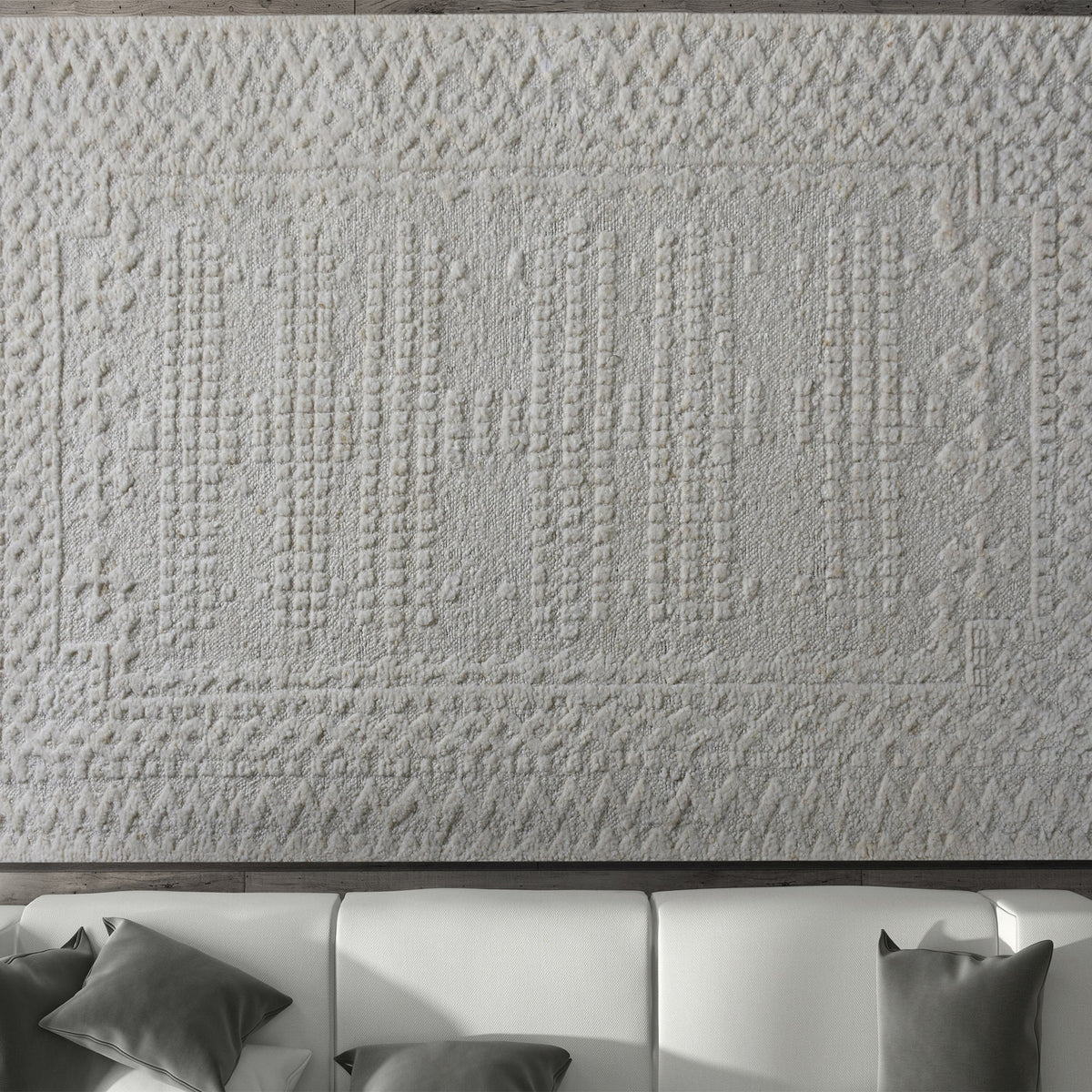 Chowk hand-knotted NZ wool rug in dove grey with a tone-on-tone raised grid and border, under a dining table