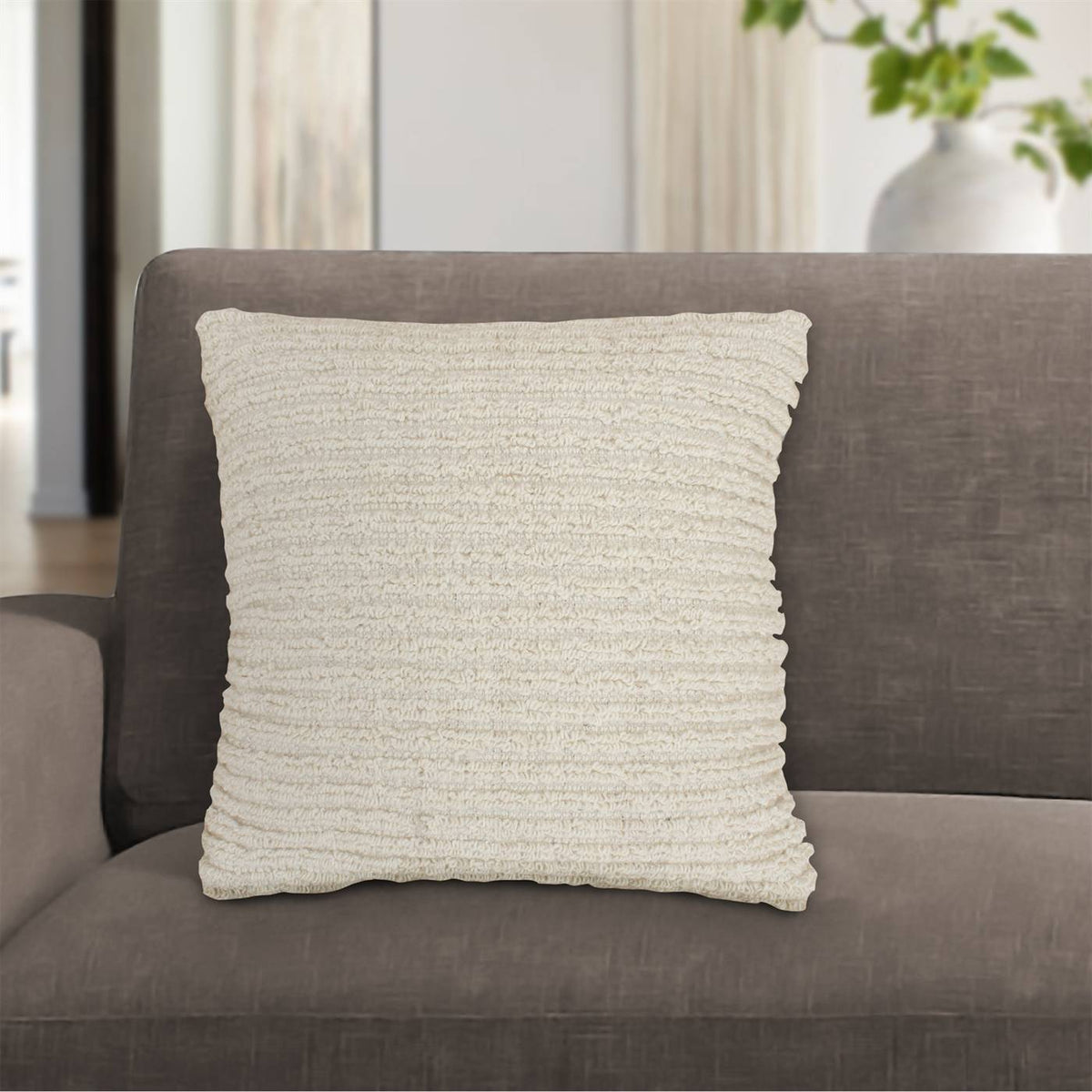 Fine Rib Handwoven Wool Cushion — Fine horizontal ribs give the ivory surface a restrained, even texture.