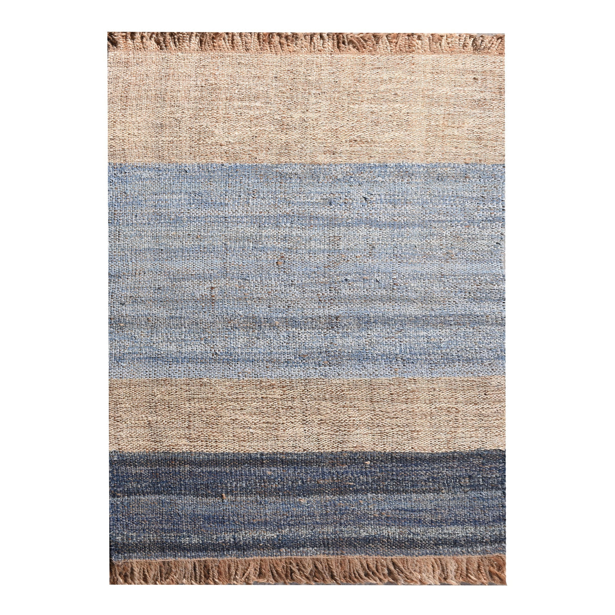 Nahar flatweave hemp and denim rug with a denim-blue stripe on natural hemp, in a living room