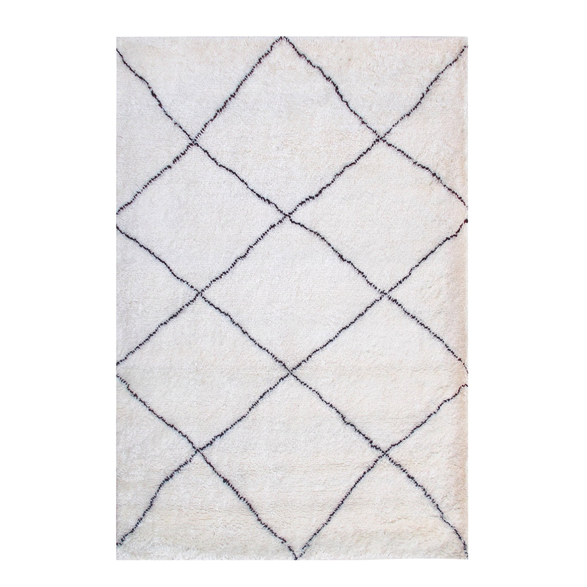 Snowfield handwoven wool rug with fine charcoal diamond lattice on ivory, in a study