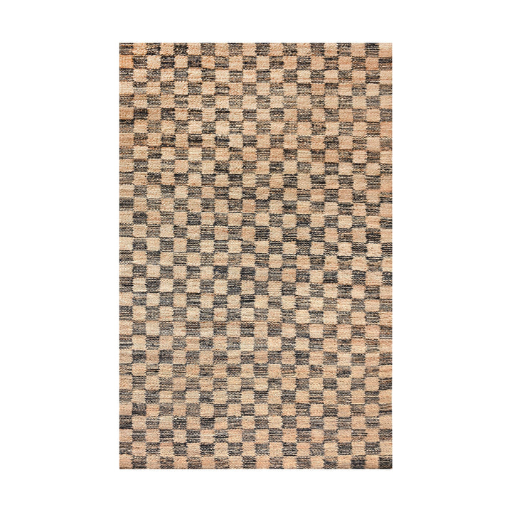 Chessboard handwoven jute rug with natural and charcoal checkerboard, in a living room