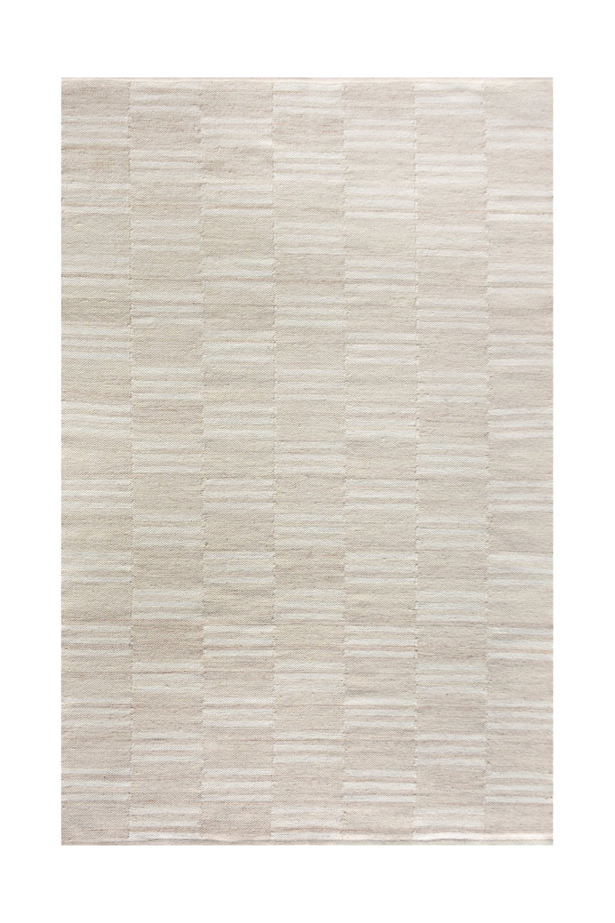 Parat handwoven wool rug in cream and oatmeal with vertical block stripes, in a bedroom