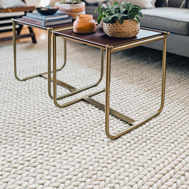 Dor handwoven chunky wool rug in charcoal, woven in thick cords, in a living room