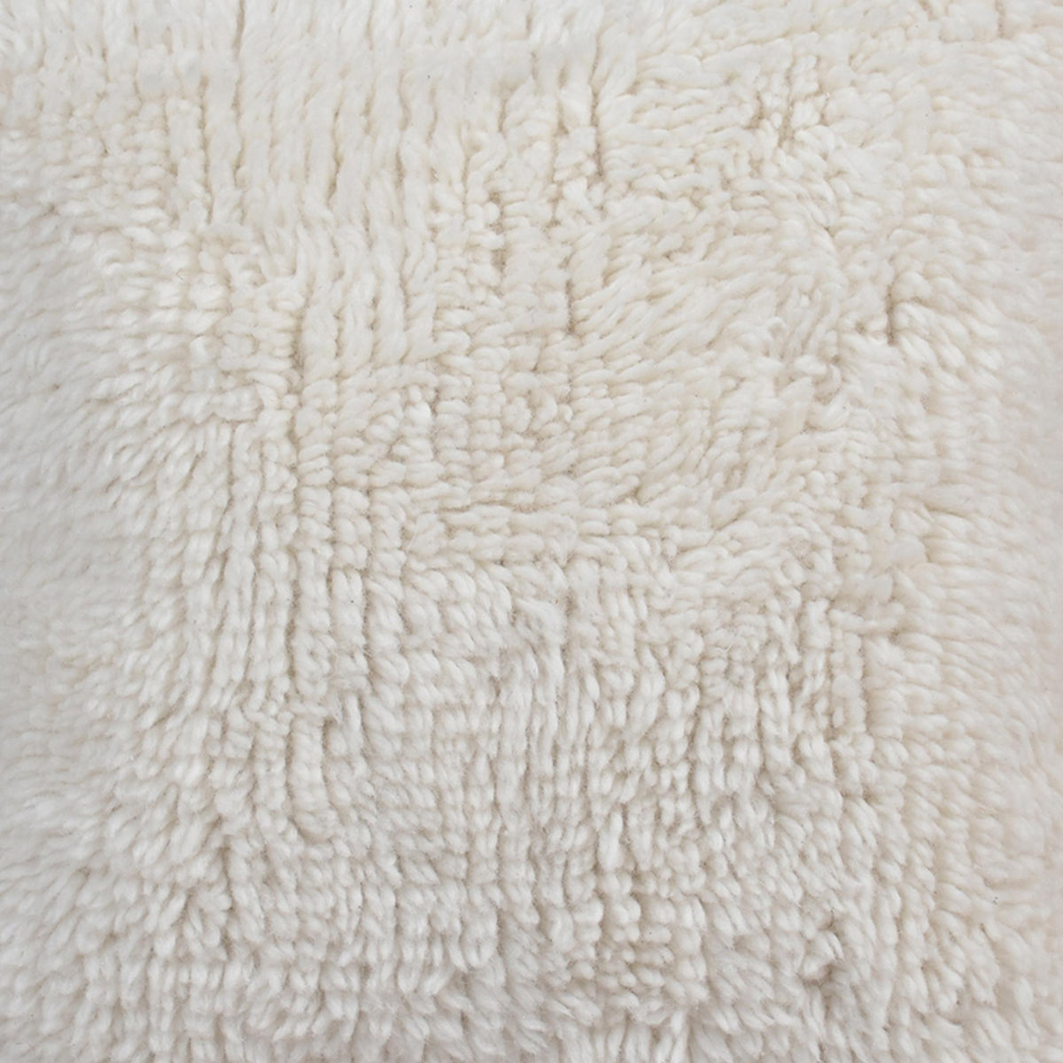 Snowmelt Handwoven New Zealand Wool Cushion — A deep ivory shag-style surface provides a soft-looking, tufted texture.