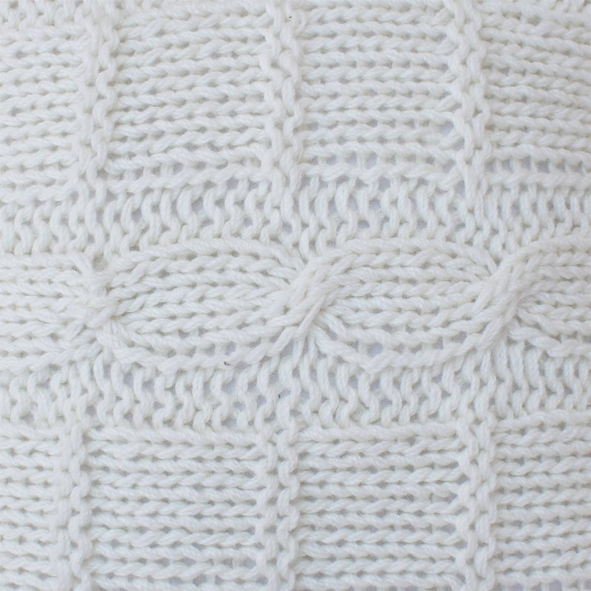 Loopwork Handknitted New Zealand Wool Cushion — An open, looped ivory pattern creates an airy knitted texture.