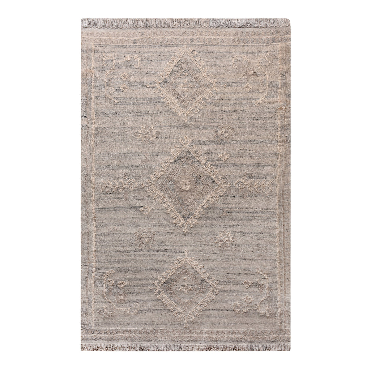 Canyon flatweave wool rug with ivory and taupe tribal diamonds, in a living room