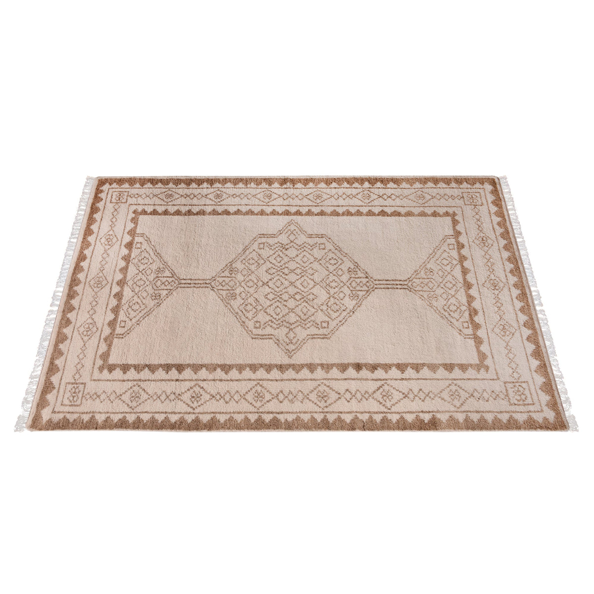Gulab hand-knotted NZ wool rug with a blush medallion on an ivory field, in a bedroom