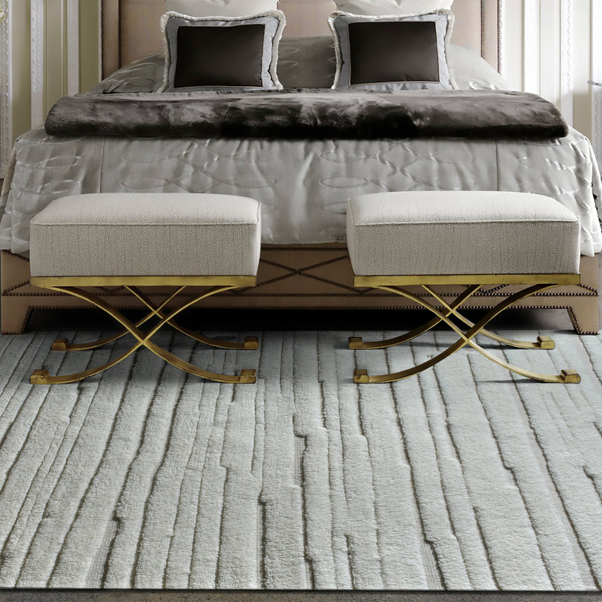 Bark handwoven ivory wool rug with carved vertical ridges, in a living room