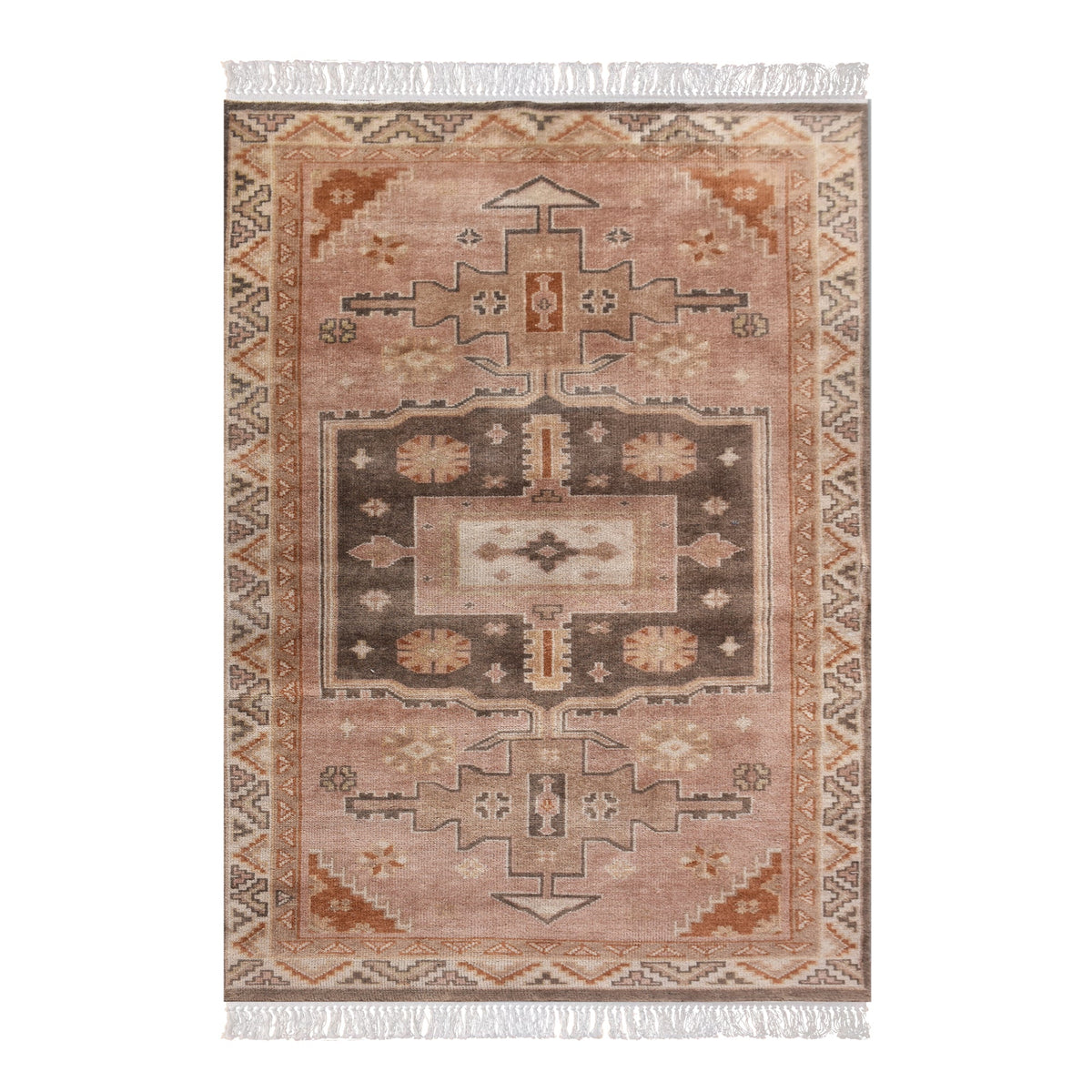 Matka hand-knotted wool rug with a faded terracotta Persian medallion, navy and brown, in a bedroom