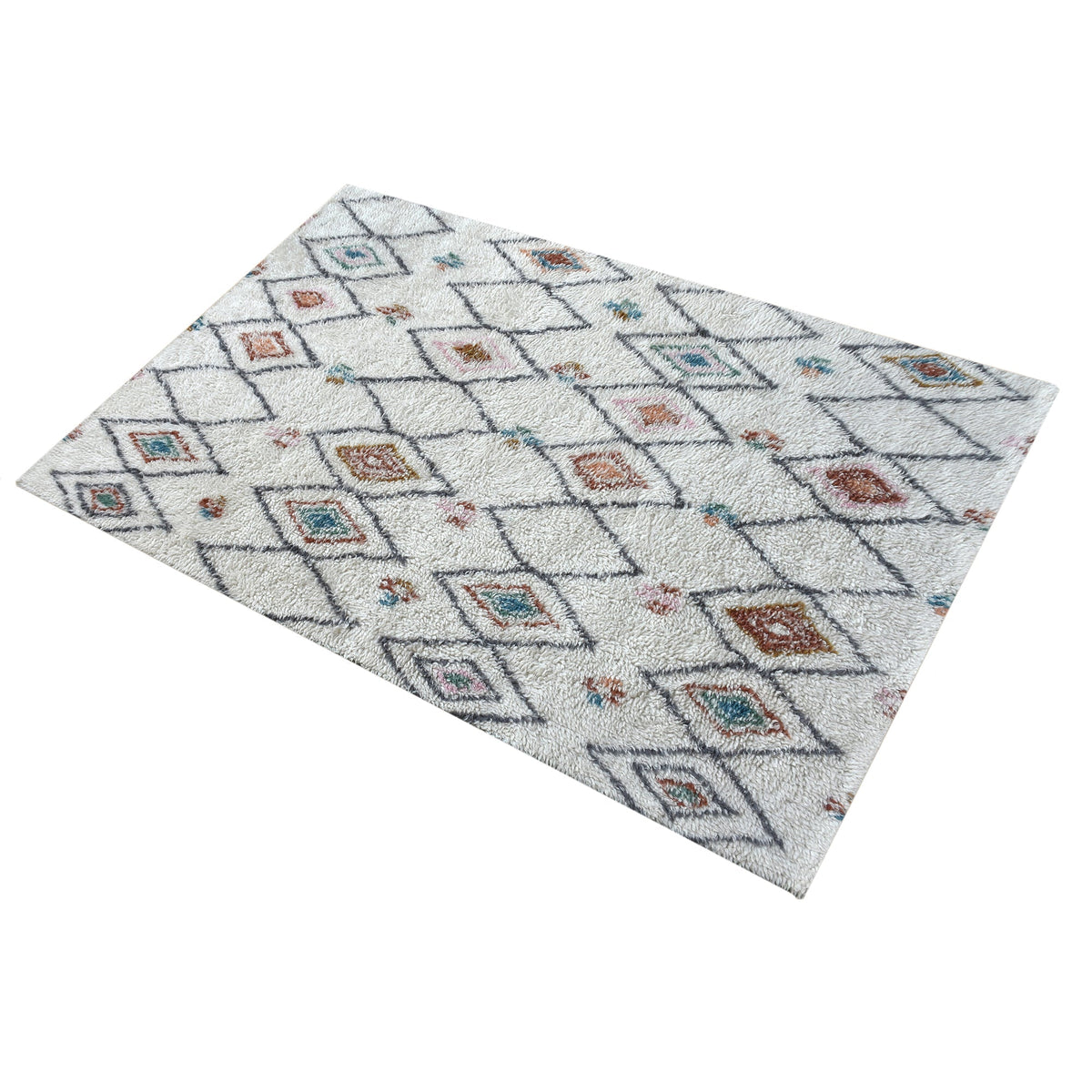 Mela tufted New Zealand wool rug with an ivory lattice and rust, teal and charcoal diamonds