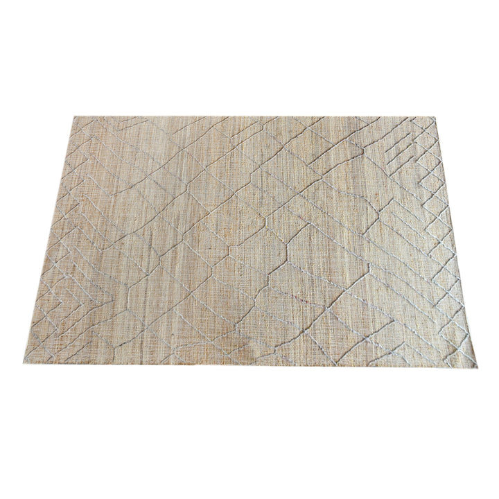 Trellis handwoven hemp and wool rug with fine diamond lattice on natural, in a living room