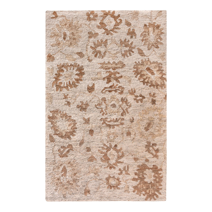 Peony hand-knotted ivory jute rug with faded terracotta florals, in a living room