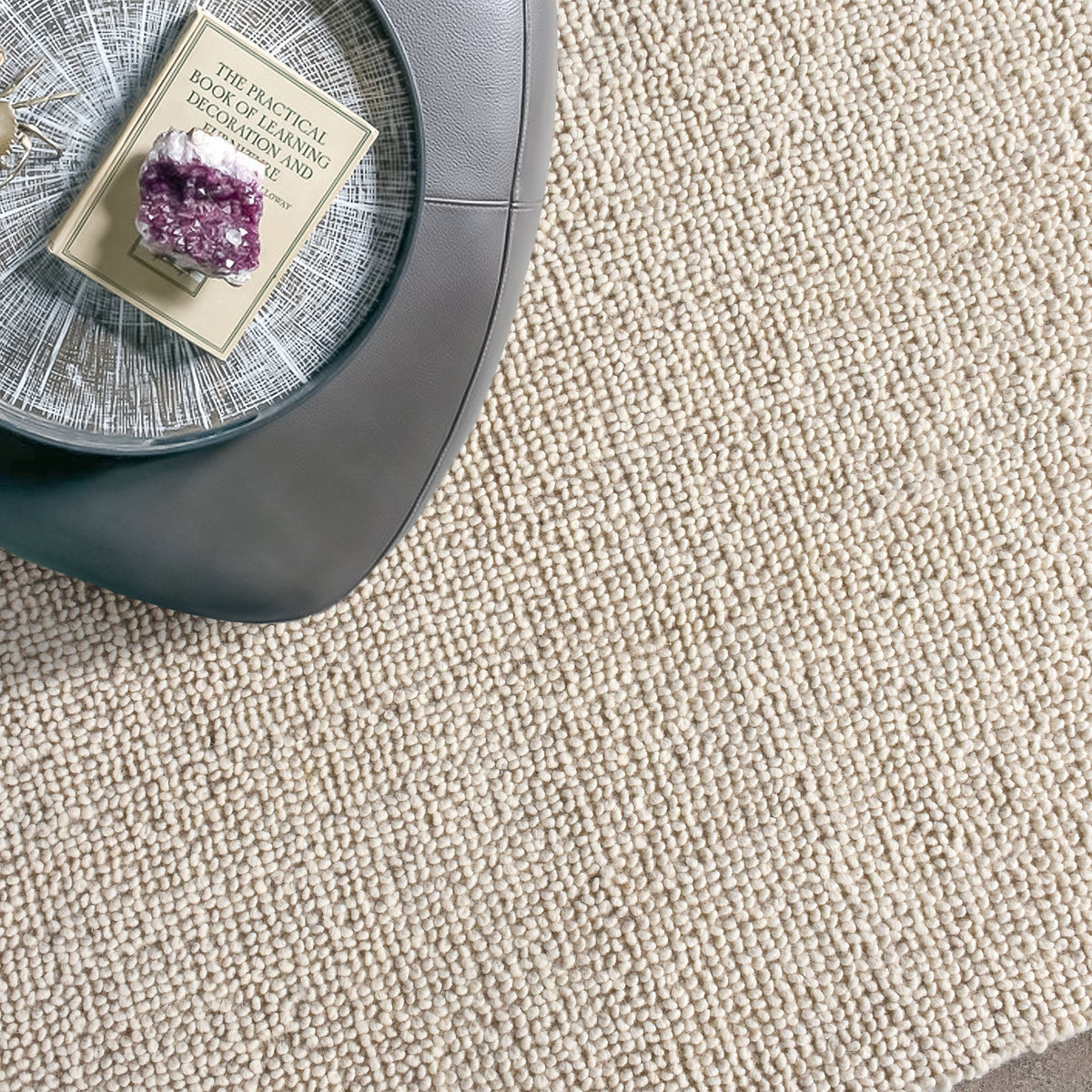 Lakeer handwoven ridged wool rug in oatmeal, tone on tone, in a bedroom