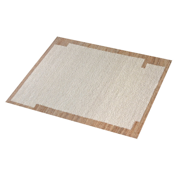 Kinari handwoven wool and jute rug in pale ivory with plain ribs and a tonal border, in a living room
