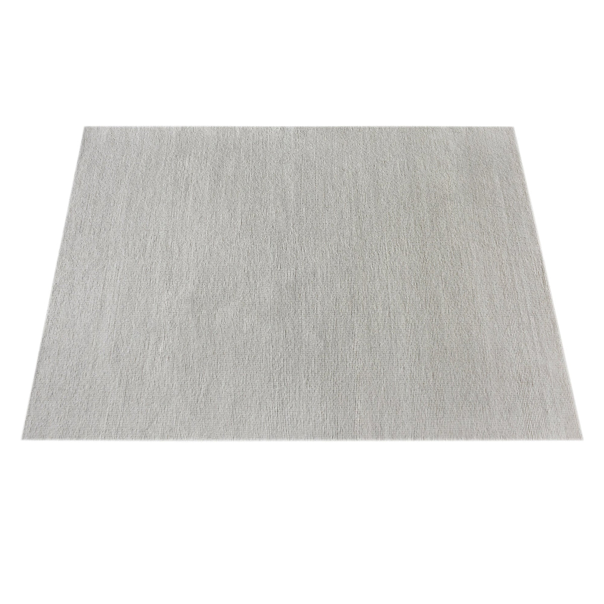 Mist handwoven pale stone wool rug with a chunky looped weave, in a living room