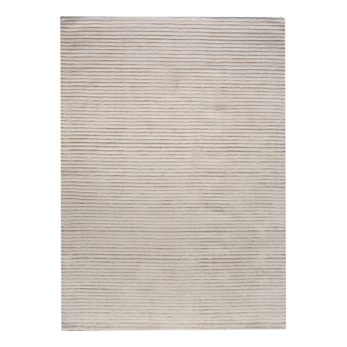 Hal handwoven NZ wool rug in ivory with wide ribbed stripes, in a dining room